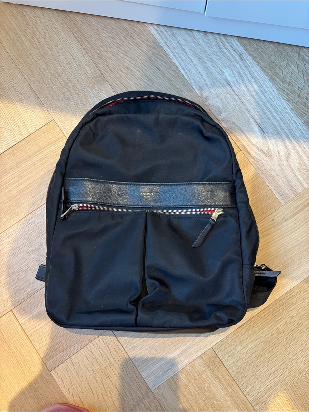KNOMO Black Nylon Laptop Backpack with Front Zip Pocket